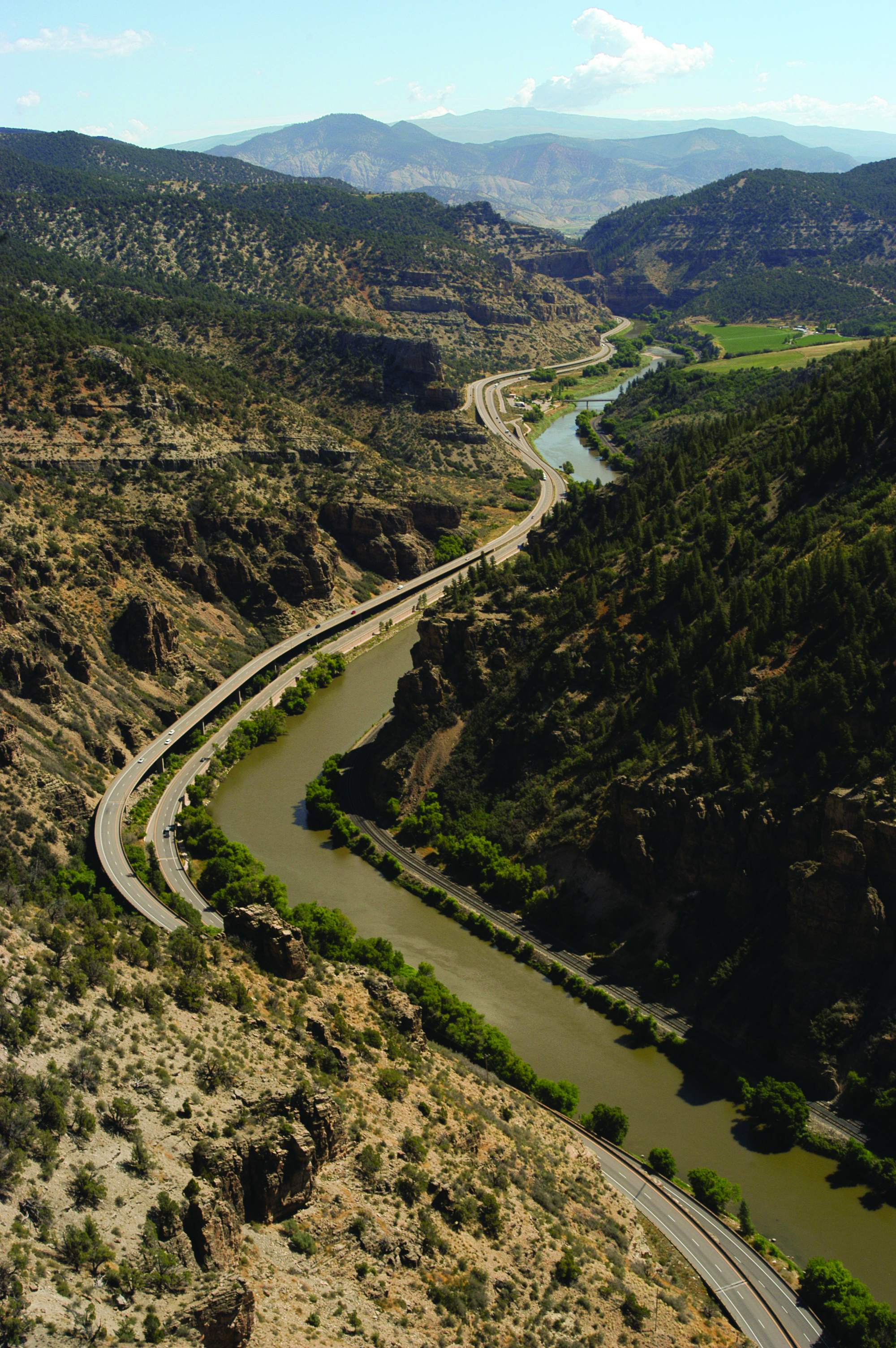 image of twisting highway through canyon