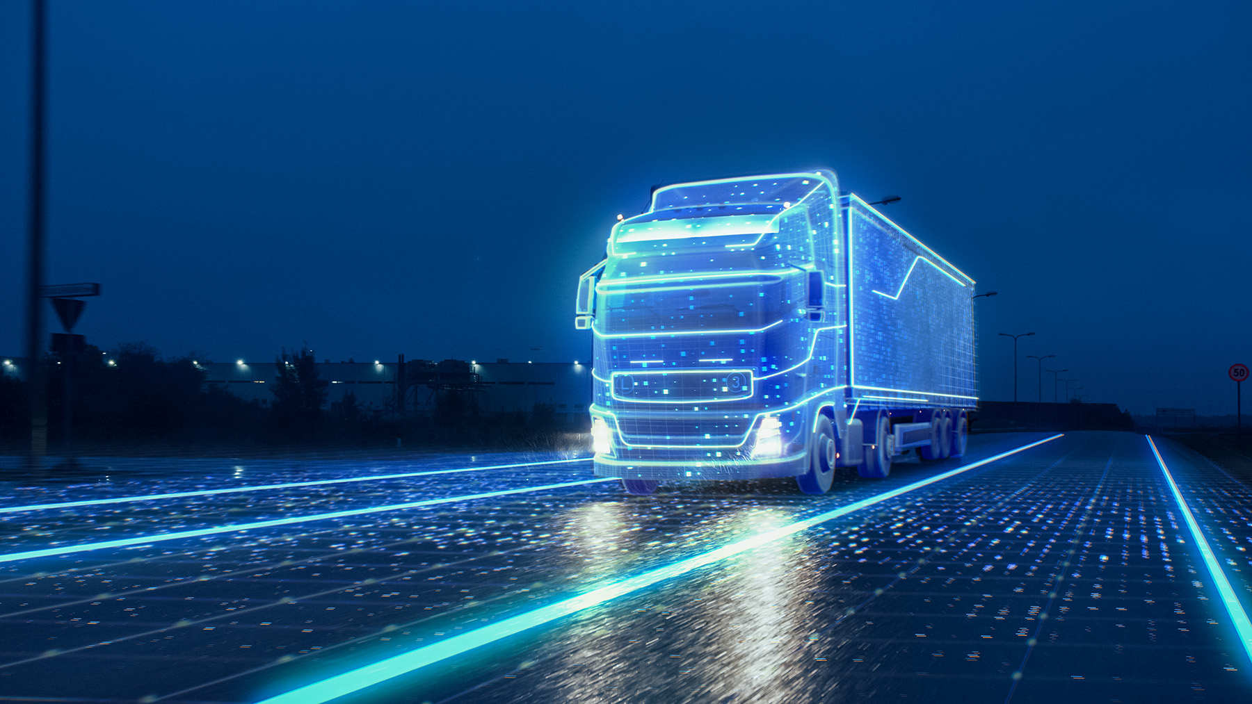 A futuristic, autonomous semitruck with cargo trailer drives at night along a highway with road sensors that scan its surroundings.