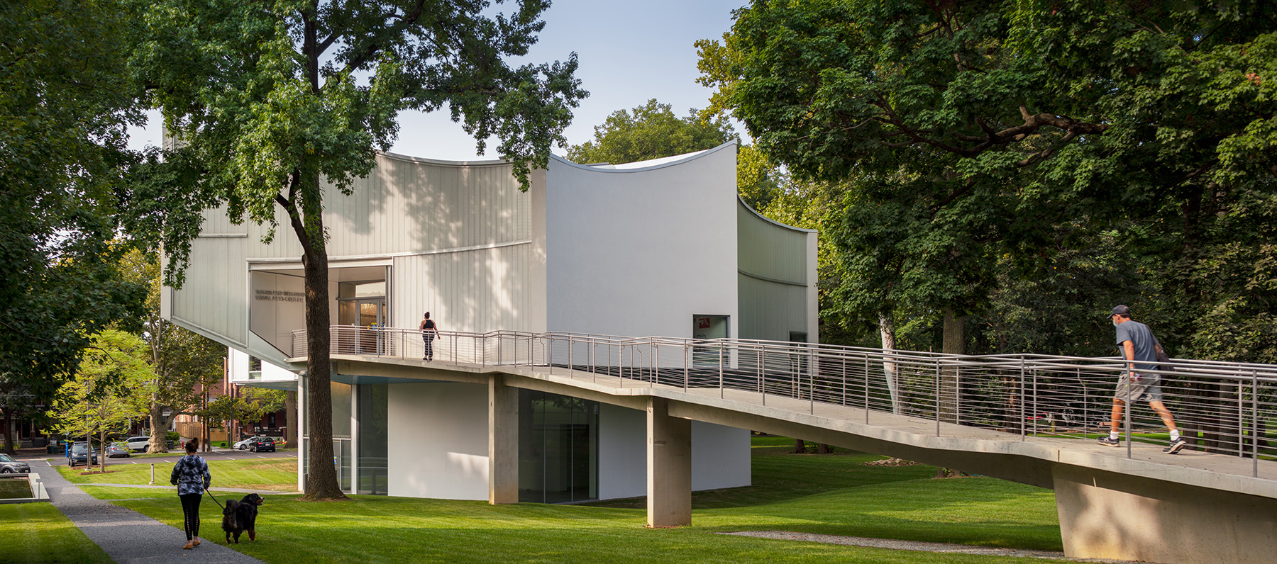 building set amid trees and green space