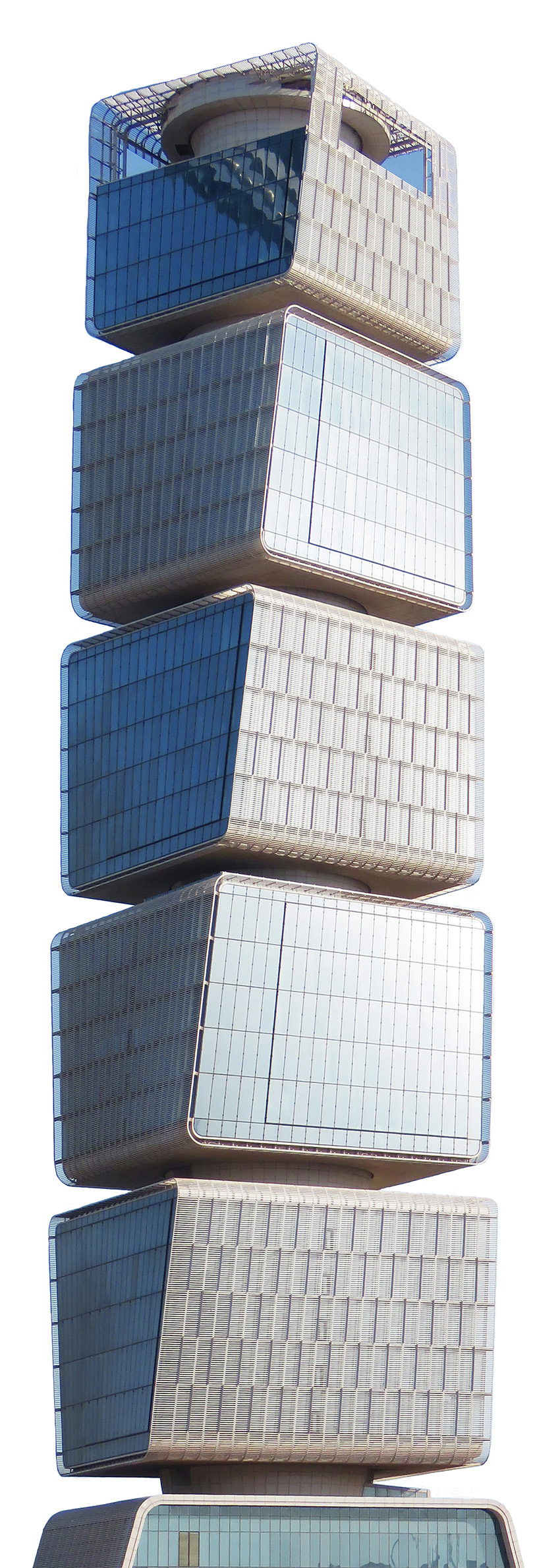 Tall structure that looks like there are multistory cubes stacked on each other. 