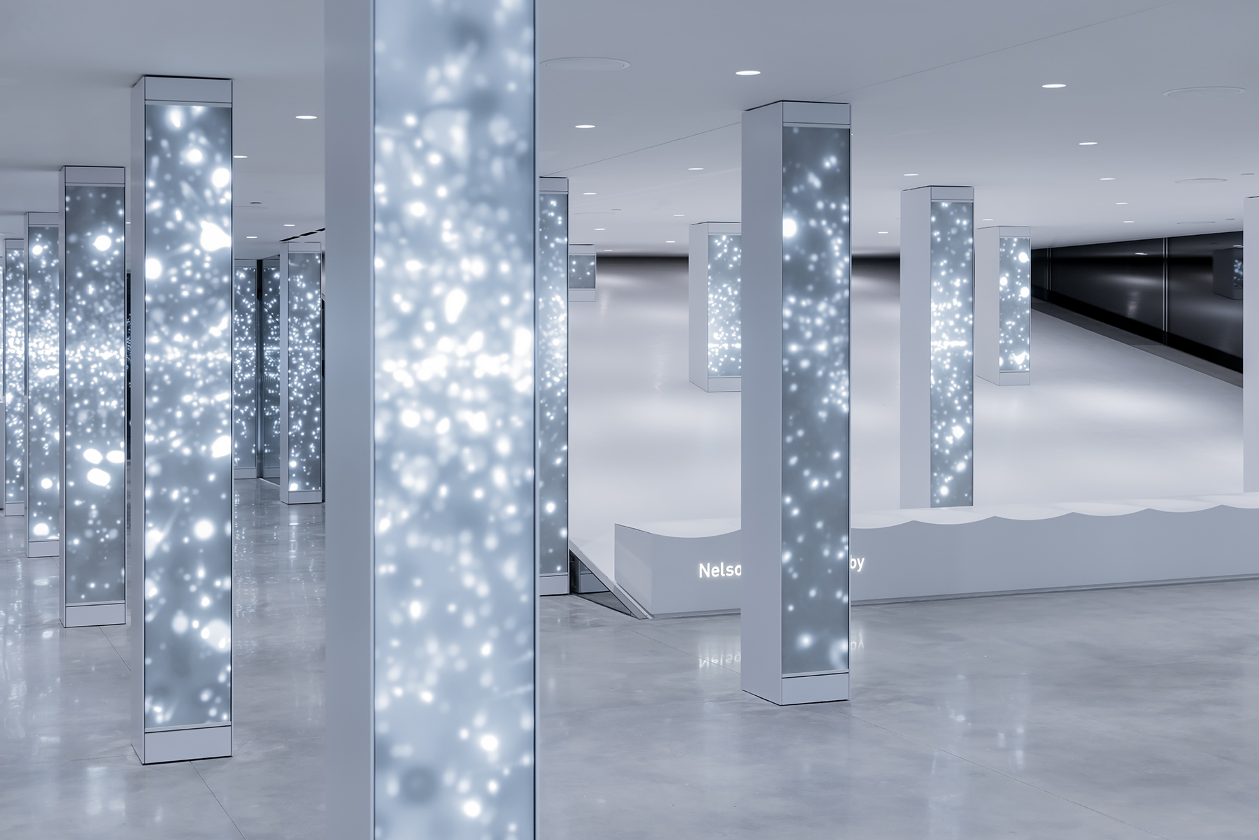 a light sculpture in a cantilevered lobby