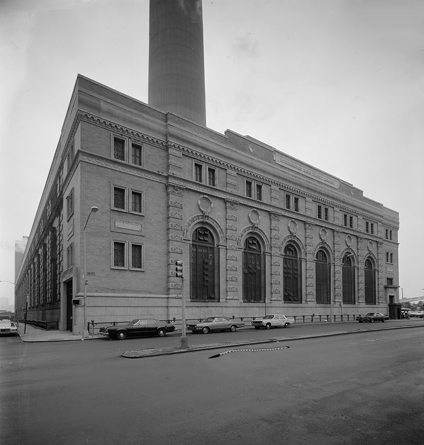Photograph of the structure that powered the New York City subway. The façade has multiple arched windows. 