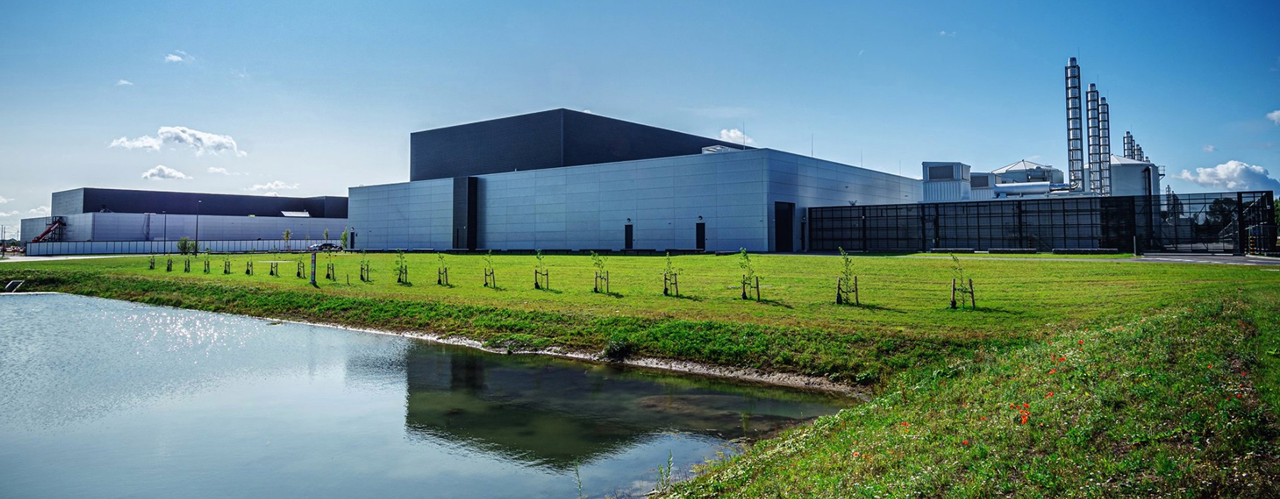 a data center sitting near a small body of water