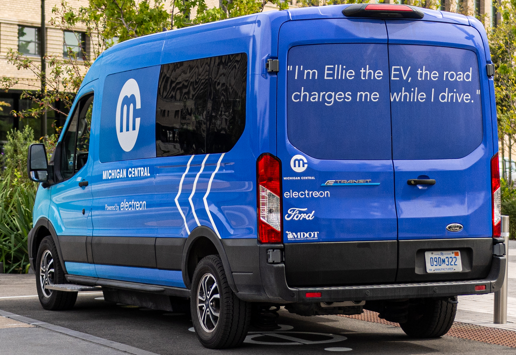 blue van with writing on back